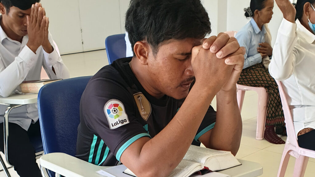 Church planters praying together